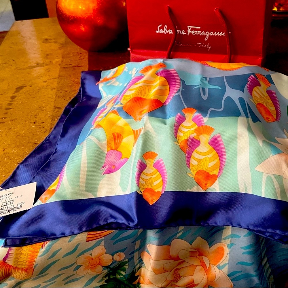 Stunning NWT and original box and bag.